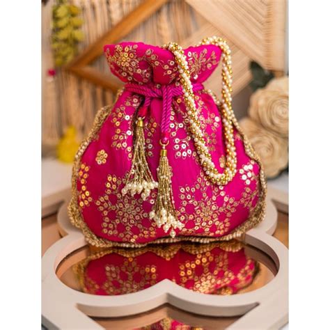 Buy NR BY NIDHI RATHI Pink & Gold-Toned Embroidered Potli Clutch Online