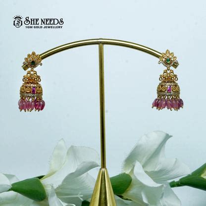 Gold plated green bead jhumkas with pink stone traditional earrings for ...