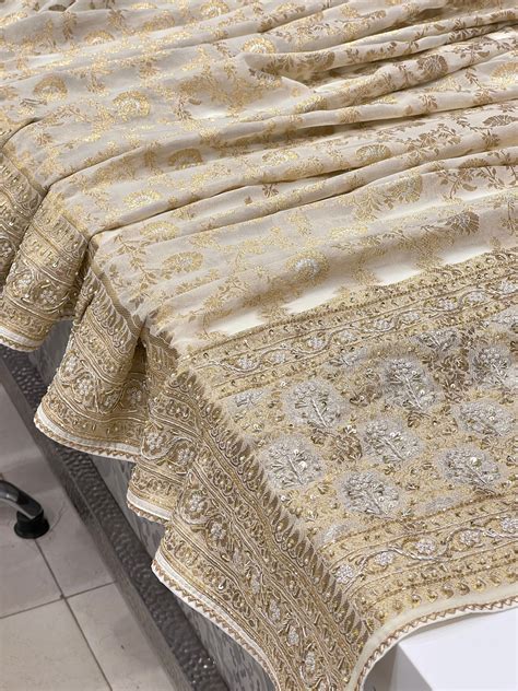 Beige Banarasi Georgette Jaal Zardozi Embroidery Saree