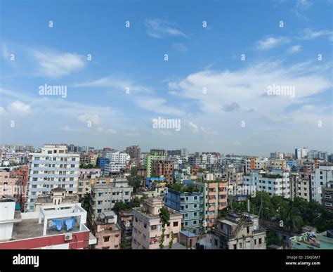 Bangladesh capital Dhaka city landscape on a sunny morning. Blue sky ...