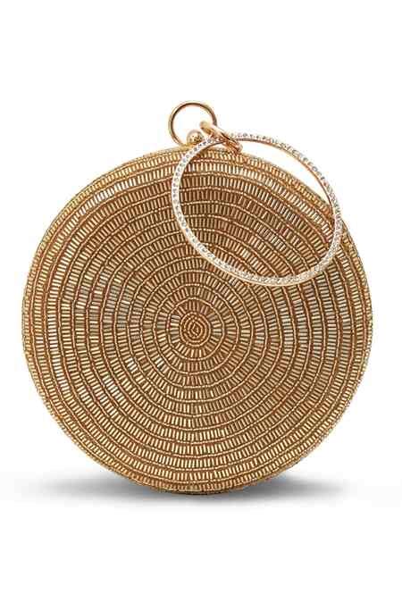 Buy Gold Glitz Round Clutch by The Tan Clan Online at Aza Fashions.