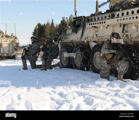 Soldiers from 2nd Stryker Cavalry Regiment, 3rd Squadron, Iron Company ...