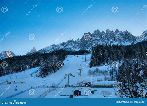 Snow Covered Mountains with a Slope and Ski Lifts in the Distance: San ...