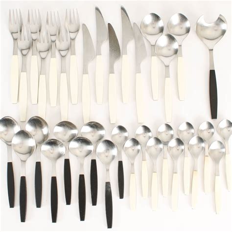 Henning Koppel for Georg Jensen. 'Strata', bestik- og serveringsdele af ...