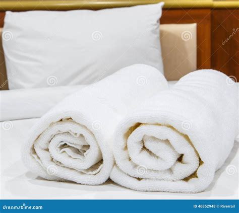 Towels on the bed stock photo. Image of cloth, terry - 46852948