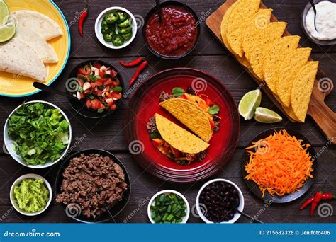 Taco Bar Table Scene With A Selection Of Ingredients On A Dark Wood ...