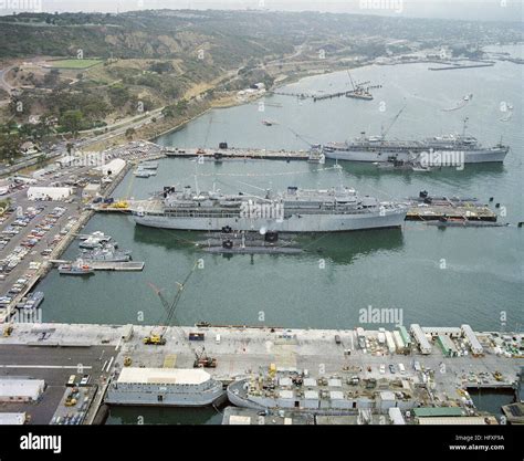An aerial starboard beam view of the Submarine Tenders USS DIXON (AS 37 ...