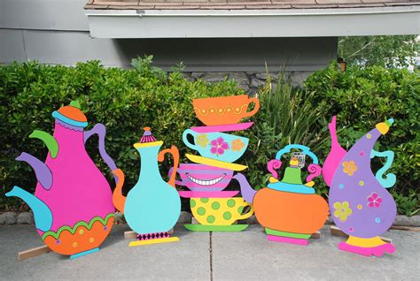 Alice in Wonderland theme Giant size teapots and stacked teac… | Alice ...