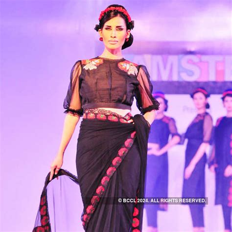 A model showcases a designer creation during Hamstech fashion show ...