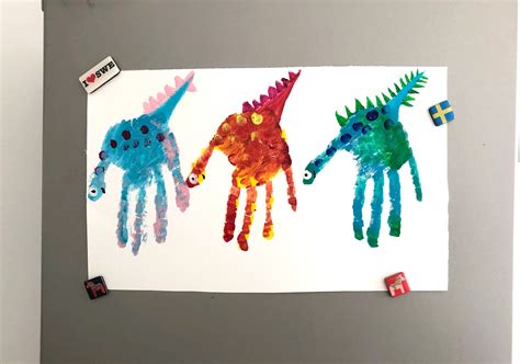 Handprint dinosaur finger painting DIY craft