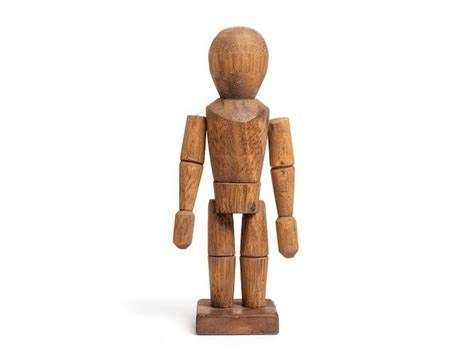 A wooden figure of a person with arms outstretched | Premium AI ...