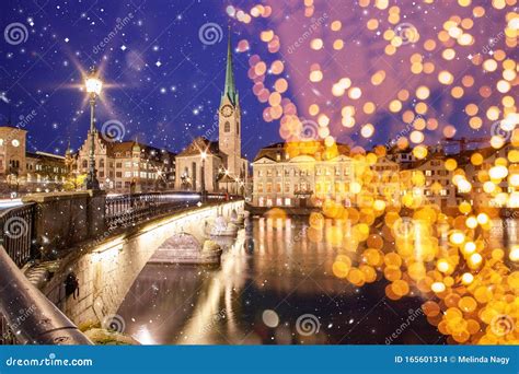 Christmas Lights and Snow in Zurich City Center with Famous Fraumunster ...