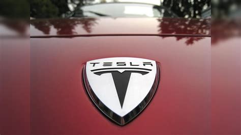 Tesla reports record profit in 2021, sees more supply chain woes in ...