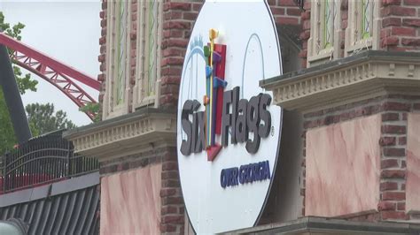 Woman charged in death of Six Flags employee ejected from van | 11alive.com