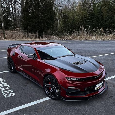 Red Chevrolet Camaro in a Parking Lot