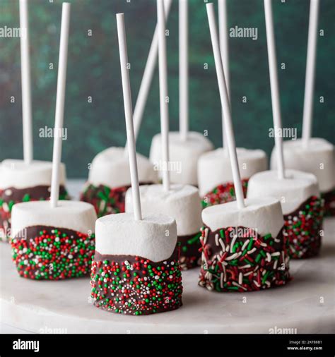 Sweet chocolate dipped marshmallow pops with festive sprinkles Stock ...