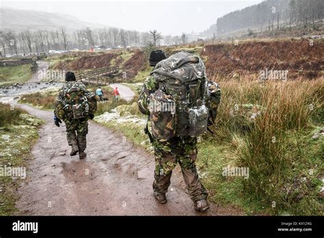 People take part in the Fan Dance, a 24km SAS Selection test march ...