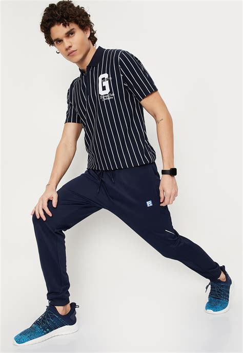Buy Men Solid Elasticated Slim Fit Active Joggers Online at just Rs ...