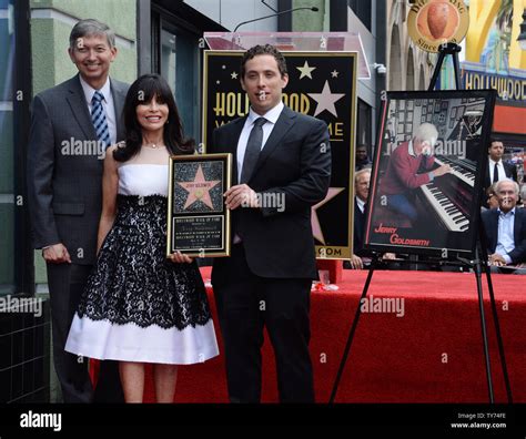 Carol Goldsmith (L) and Aaron Goldsmith, the wife and son of Oscar ...