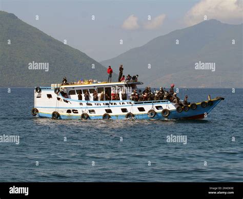 Maumere, Indonesia-May 23, 2023: An inter-island ferry in Indonesia is sailing from the port of ...