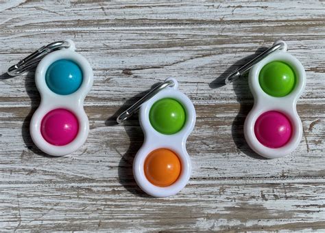 Image result for Simple Dimple Fidges