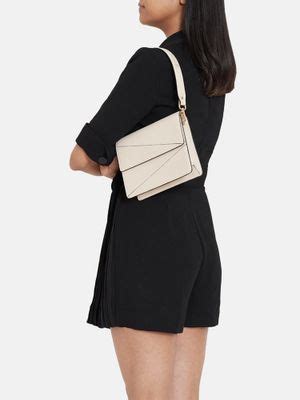 Buy Adisee Diana Ivory Sling And Cross Bags Online