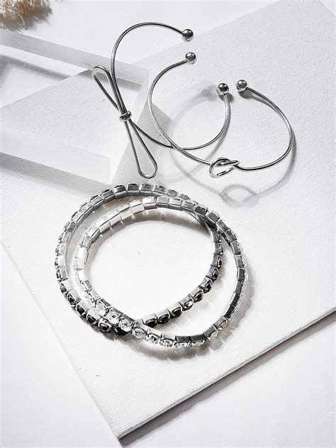 Toniq Set Of 4 Silver & Black Stacking Bracelet Set For Women