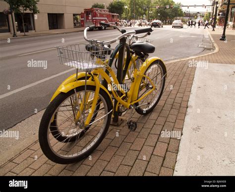 Yellow bikes. Bike share program, Lexington, Kentucky Stock Photo - Alamy