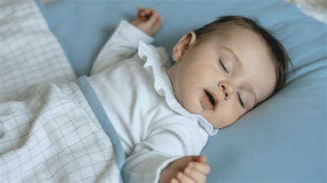 Why Do Babies Smile in Their Sleep: Science and Beliefs - Holistic Moms