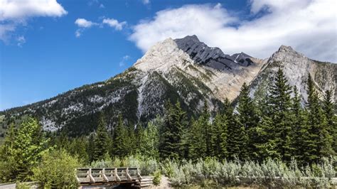 Download wallpaper 1366x768 mountains, bridge, river, landscape, nature ...