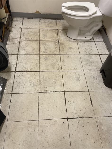 I work fast food, how do I get these stains off the tile floors? I ...