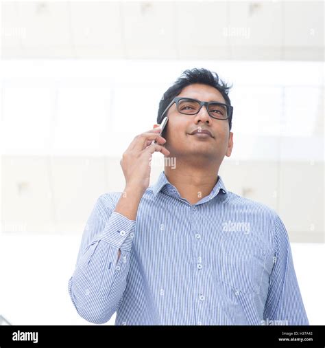 Indian man on the phone Stock Photo - Alamy