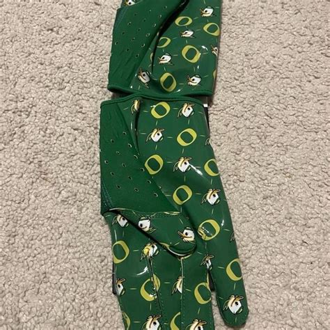 Green and yellow Oregon Ducks football gloves XL... | Depop