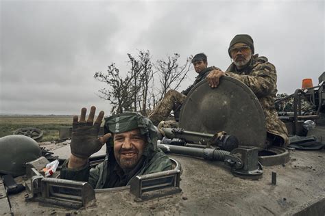 Ukraine reclaims more territory, reports capturing many POWs | AP News