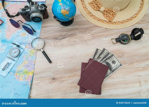 Travel Preparation : Compass, Money, Passport, Road Map ,hat,sunglasses ...