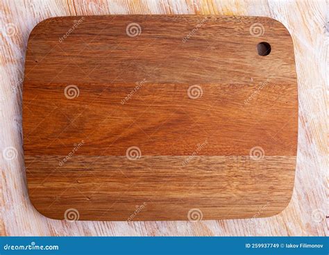 Natural Brown Wood Cutting Board on Wooden Table Stock Image - Image of wood, utility: 259937749