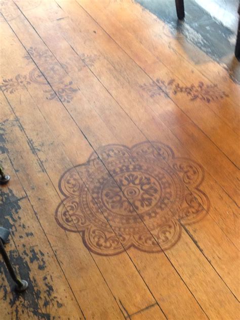 Stenciling on wood floor | Painted wood floors, Stencil wood, Flooring