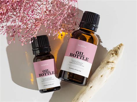 Free Small Amber Essential Oil Bottles Mockup PSD - Good Mockups