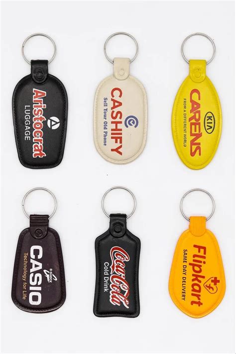 KEY CHAINS - Plastic Vinyl Sticker Keychain Trader - Wholesaler ...