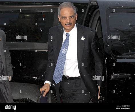 US Attorney General Eric H. Holder Jr. arrives with the US delegation ...