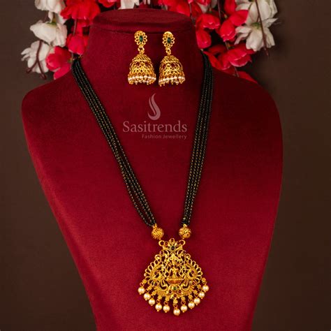 Classic Traditional Matt Gold Lakshmi Pendant Necklace Set with Jhumkas ...