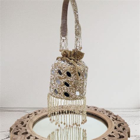 Jhalak Gold Mirror Potli – BAGZAPPERR