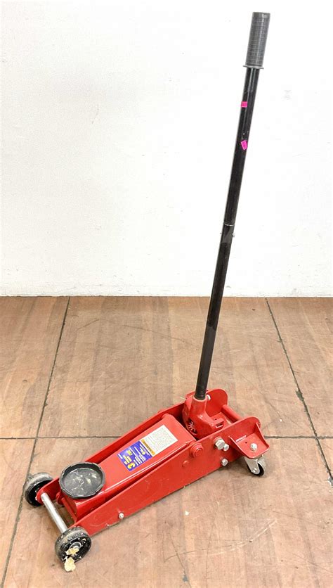 Lot - Napa 3 Ton Hydraulic Floor Jack