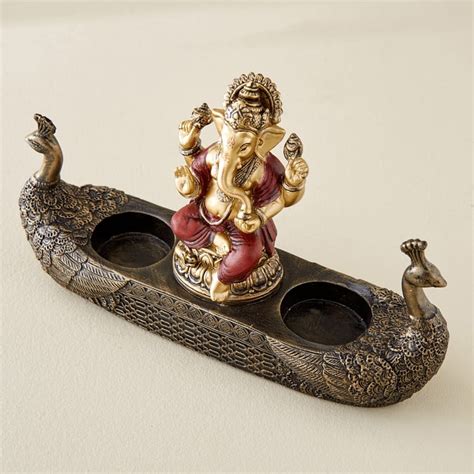 Buy Alpana Fiesta Polyresin Ganesha Figurine with Peacock T-Light ...