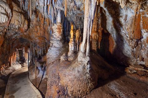 Stalactites, stalagmites and pillars in a limestone cave in Australia ...