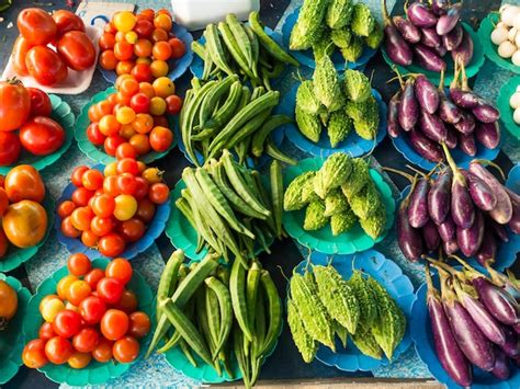 High angle view of vegetables for sale at market stall | Premium Photo