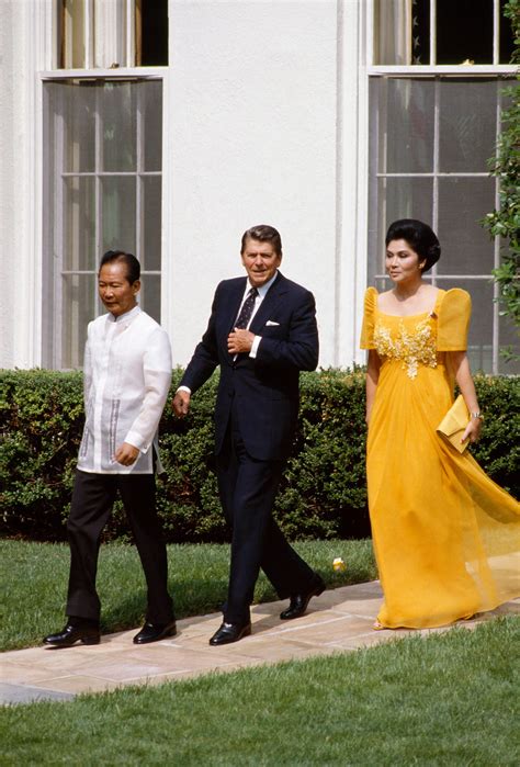 https://hips.hearstapps.com/hmg-prod/images/president-ronald-reagan-walks-with-philippine-president-news-photo-1573160756.jpg?crop=1.00xw%3A0.679xh%3B0.00170xw