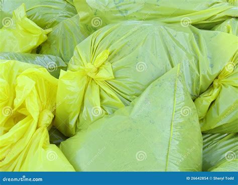 Yellow Lawn Trash Bags Full Stock Photo - Image of plastic, city: 26642854