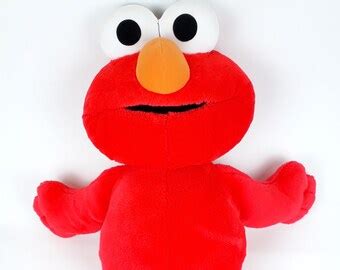 Burn Elmo Toy 的图像结果