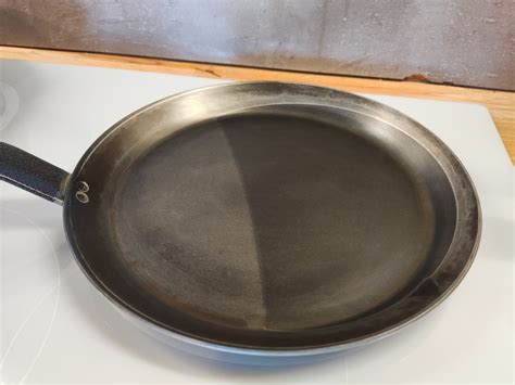 Is this a carbon steel De Buyer Pan? Is it precoated because I can't ...